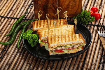 Club sandwich with chicken cheese and salad