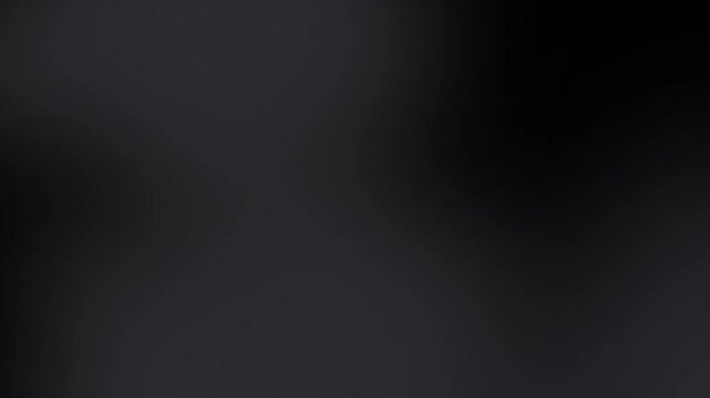 Black grey background with light reflections suitable for elegant design projects, website backgrounds, or text overlays in modern layouts.