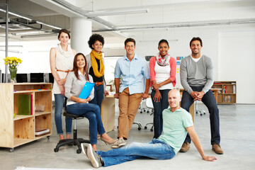 Team, portrait and startup in office for diversity, support or solidarity with inclusion at company. Business people, men and women for smile, staff or together with pride in group at creative agency