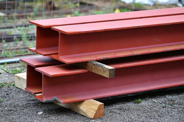 Red steel girders on a construction site