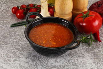 Hot tomato soup with diced chicken