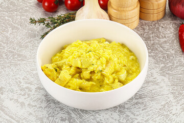 Italian cuisine - yellow risotto with chicken