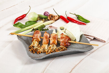 Thai Street foof satay with bacon and mushroom