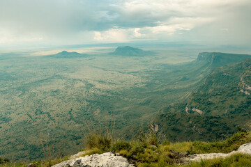 Obraz premium A panoramic view of Karamoja's mountain landscapes with Mount Kadam at the background seen from Mount Napak, Uganda 