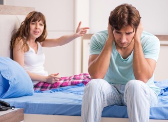 Obraz premium Young couple in the bedroom