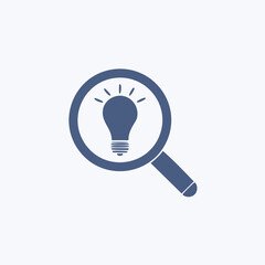 Finding solutions with a magnifying glass. A simple illustration of a magnifying glass focused on a lightbulb. This icon represents the concept of discovering solutions and finding answers.