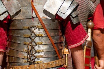 detail of the armor of a Roman legionary in a historical recreation in Portugal, Festa dos Povos in...