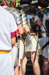 roman legionaries parading in line at a historical reenactment festival