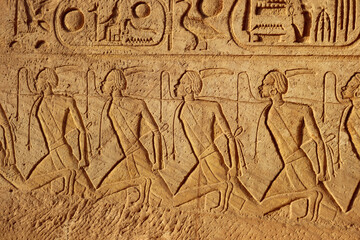Ancient egyptian carvings and hieroglyphs at Abu Simbel temple