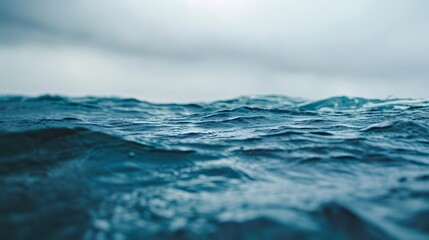 Obraz premium Macro shot of the rippling ocean surface under an overcast sky AI generated illustration