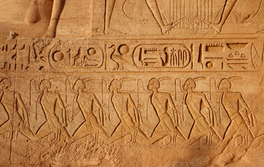Ancient egyptian carvings and hieroglyphs at Abu Simbel temple