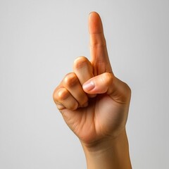 A Hand With One Finger Pointing Upwards