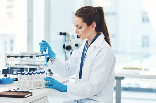 Woman, pipette and scientist with medical research, chemistry laboratory and science for pharmaceutical in Denmark. Female person, petri dish and sample in pathology, test or analysis in mpox vaccine