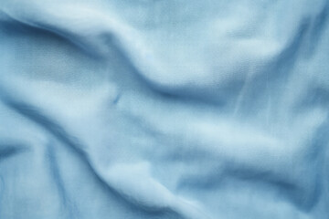 Fototapeta premium Processed collage of folded denims jean blue fabric texture. Background for banner, backdrop
