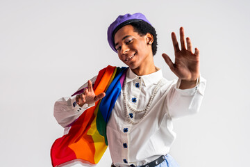 Fashionable fluid gender man wearing non binary clothing posing in studio - Hispanic black male with cross dressing attire