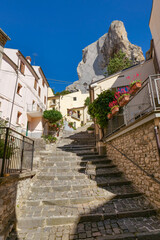 A street between old houses in Pietrabbondante, a village in Molise in Italy.