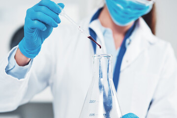 Fototapeta premium Scientist, hand and woman with pipette in laboratory for medical investigation, study or research. Science, pharmaceutical and beaker with blood for Mpox vaccine, development or healthcare experiment