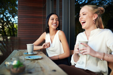 Women, friends and happy on balcony with coffee at home for break, bonding and conversation. People, outside and laugh or smile with tea for social visit, chat and gossip to relax with chilling