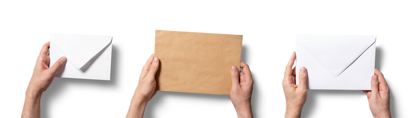 Obraz premium Hands present multiple envelopes in distinct styles, showcasing a white envelope, a brown envelope, and a larger envelope, highlighting variety in design and texture