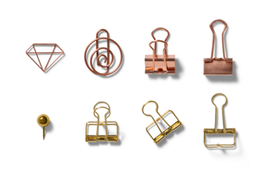 An organized display of assorted metal clips including a diamond shape, spiral, and binder clips, positioned on a pristine white backdrop