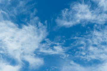 The sky is blue and clear with a few clouds scattered throughout