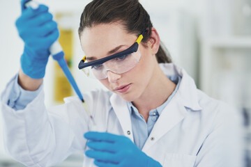 Woman, scientist and liquid on pipette or test tube for medical research, investigation and...