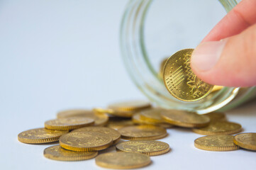 Golden coins and jar background with customizable space for text or ideas. Wealth and copy space concept