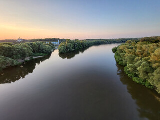 The Desna River in the evening in the summer on a cloudless day. View from above. Chernihiv, Ukraine.
