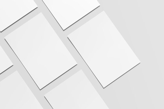 White blank sheets of a4 paper size or documents mockup on a gray background. Template for design.