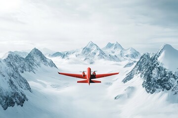 Red plane flying over snowy mountains under cloudy skies