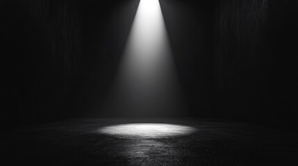 Black backdrop with a bright spotlight in the center, ideal for emphasizing a key object or figure.