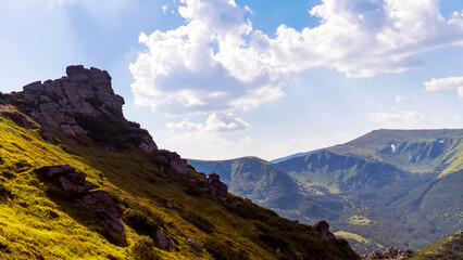 Green beautiful mountains in the sunny day.