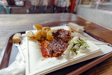 A delightful lunch featuring Tuscan produce at a charming farmers market in Florence, inviting the...