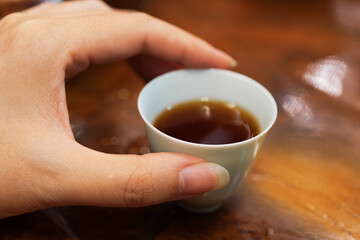 cup of tea in hand