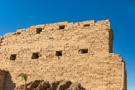 Step through Karnak's grand entrance and journey back in time. This timeless portal offers a glimpse into the grandeur of ancient Egypt and the architectural marvels of the pharaohs.