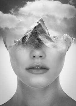 Black and white portrait of a beautiful woman and mountain in a double exposure concept, collage