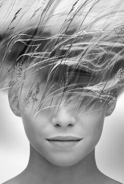 Black and white portrait of a beautiful woman and the steppe in a double exposure concept, collage