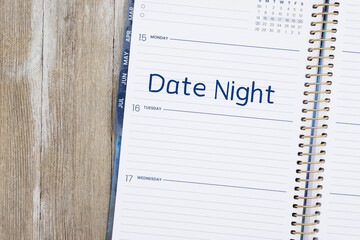 Date Night on day planner on wood desk