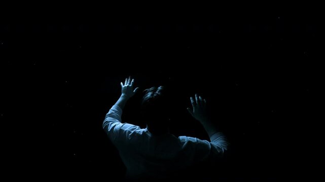 Male Looks out at the Starts at Night Rotating