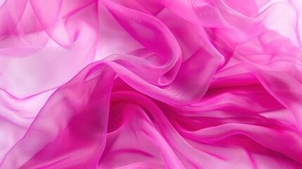 Fototapeta premium A flat lay of organza fabric in a bright fuchsia, with its sheer, lightweight texture adding a pop of color