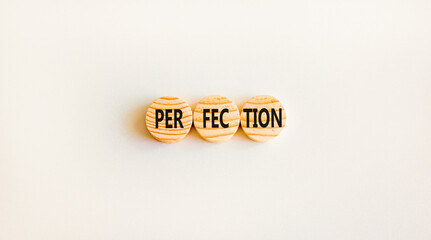 Perfection symbol. Concept word Perfection on beautiful wooden circles. Beautiful white background. Business perfection concept. Copy space.