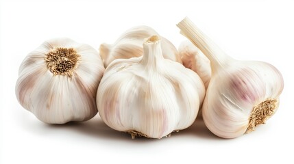 Four whole garlic bulbs, isolated on a white background.
