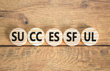 Successful symbol. Concept word Successful on beautiful wooden circles. Beautiful wooden background. Business successful concept. Copy space.