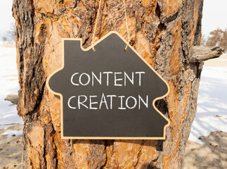 Time for content creation symbol. Concept words Content creation on beautiful black house...
