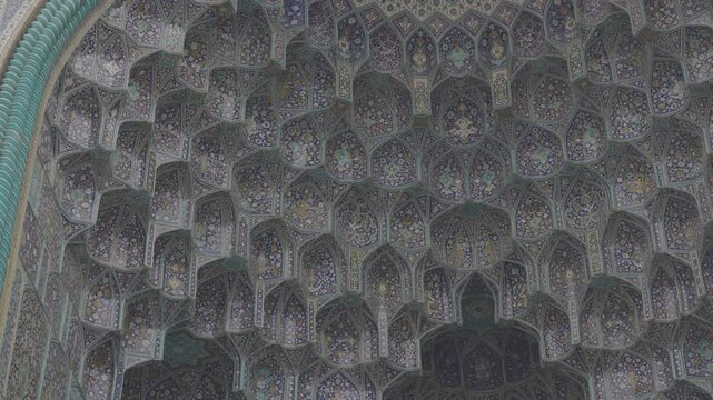 Ceiling at Imam Mosque, arch at the entrance, Isfahan, Iran. Beautiful oldest iranian mosque interior design. A masterpiece of Persian architecture. ProRes 422, ungraded C-LOG 10 bit video