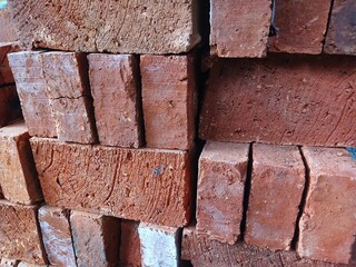 Red brick texture stacked for building materials.