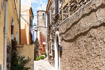 Street photography, beautiful alley of Castelsardo old city - Sardinia - Italy.