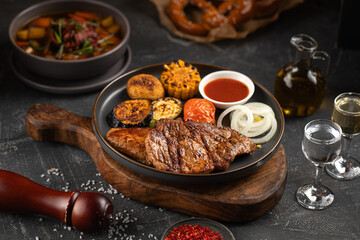 Portion of german grilled pork meat with vegetables