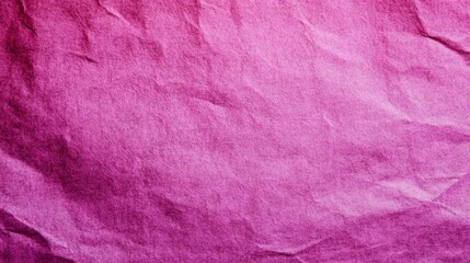 Fototapeta premium Vibrant pink textured paper background suitable for creative projects and design work