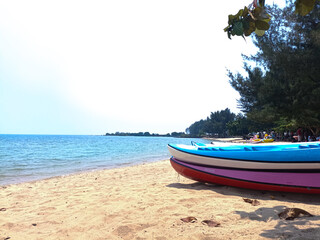 Fototapeta premium Canoes are displayed on Blebak Beach, Jepara